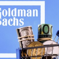 Crypto and traditional currencies fill a shopping cart in front of the Goldman Sachs bank logo