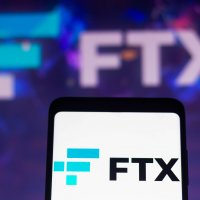  FTX logo on a smartphone screen