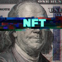 NFT written across a $100 bill