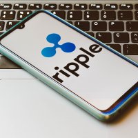 The Ripple (XRP) logo on a smartphone