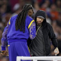 Snoop Dogg and Eminem perform during the Pepsi Super Bowl LVI Halftime Show at SoFi Stadium in February 2022 in Inglewood, California