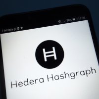 The Hedera logo on a mobile phone