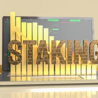 The word “staking” in front of a price graph
