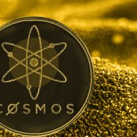 ATOM coin on a yellow digital background