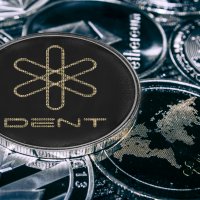 Image of a coin with the DENT logo, foregrounding competing coins – Photo: Shutterstocke
