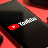 YouTube logo shown on a smartphone screen