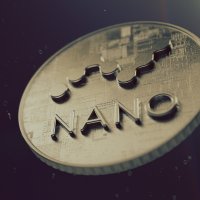 A Nano coin set against a dark background 