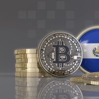 3D rendering of some metallic Bitcoins in front of an badge with the Salvadoran flag