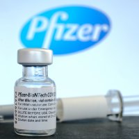 Covid-19 vaccine with Pfizer logo