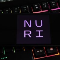 A smartphone displays the crypto bank Nuri’s name on its screen