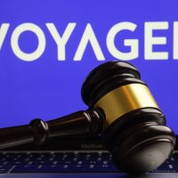 An illustration of a judge’s gavel in front of the company name, Voyager