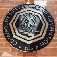 Logo of Commodity Futures Trading Commission on a wall