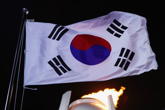  The Flag of South Korea and the Olympic Cauldron during the opening ceremony of the PyeongChang 2018 Winter Olympic Games