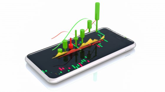 3D image of candlestick trading chart emerging from smartphone