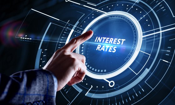 Representative image of a hand pointing to the words “interest rates”