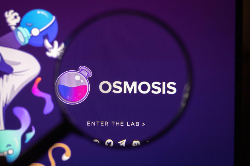 The Osmosis (OSMO) cryptocurrency logo showing a science experiment beaker behind a magnifying glass on dark purple background
