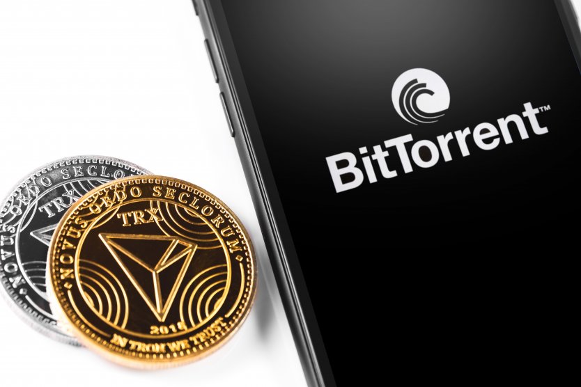 BitTorrent logo with two BTT coins