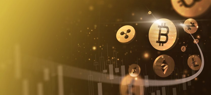 A variety of cryptocurrencies on a gold background