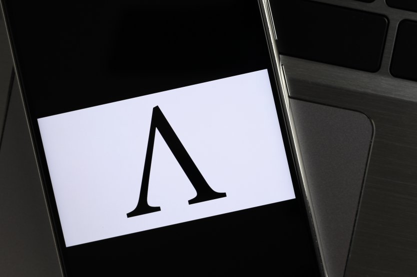 The Ampleforth logo on a smartphone