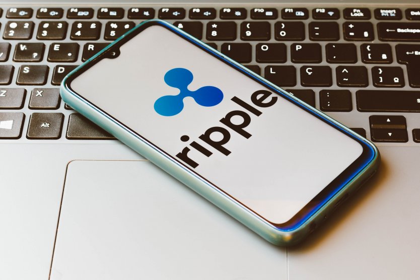 The Ripple (XRP) logo on a smartphone
