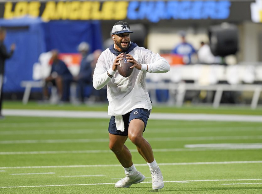 Quarterback Dak Prescott of the Dallas Cowboys warms up before a preseason game against the Los Angeles Chargers on 20 August 2022