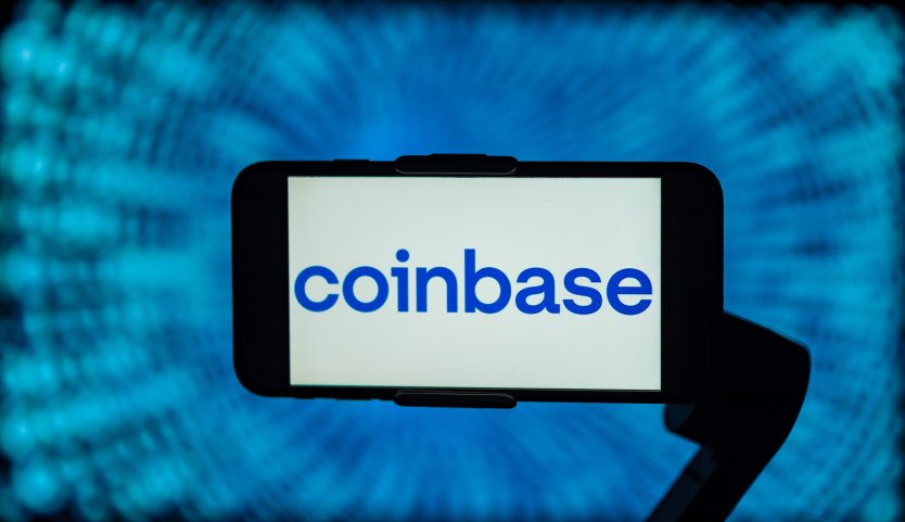 In this photo illustration, the logo of Coinbase is seen displayed on a mobile phone screen