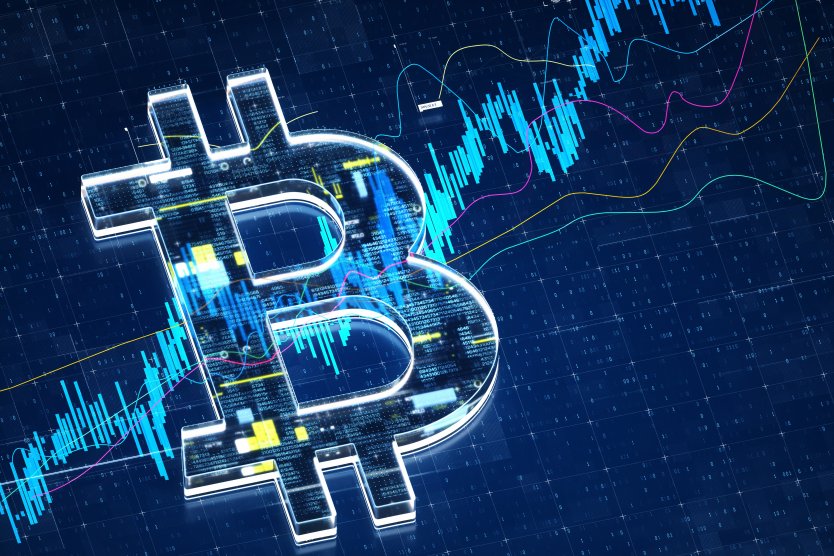 Digital generated image of Bitcoin sign stock market data on blue background