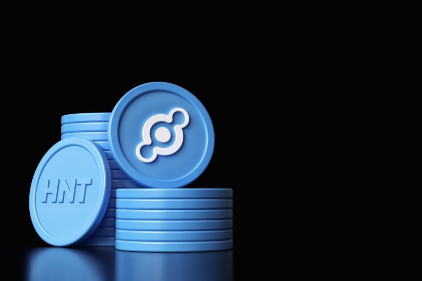 A stack of blue coins with the Helium logo