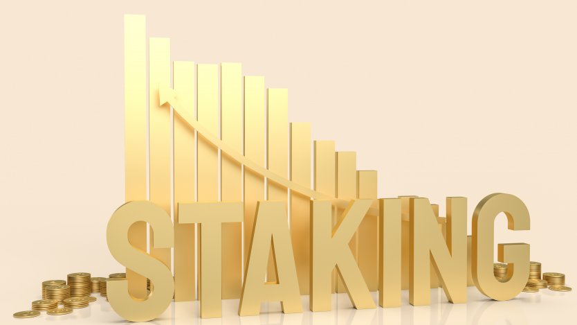 “Staking” in gold text in front of a bar graph