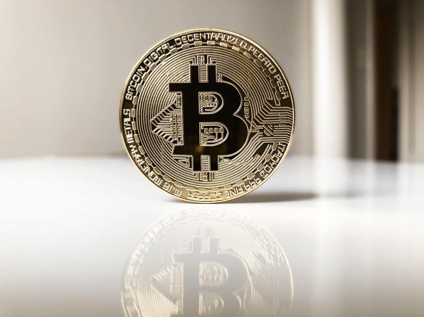 Bitcoin logo on a physical coin