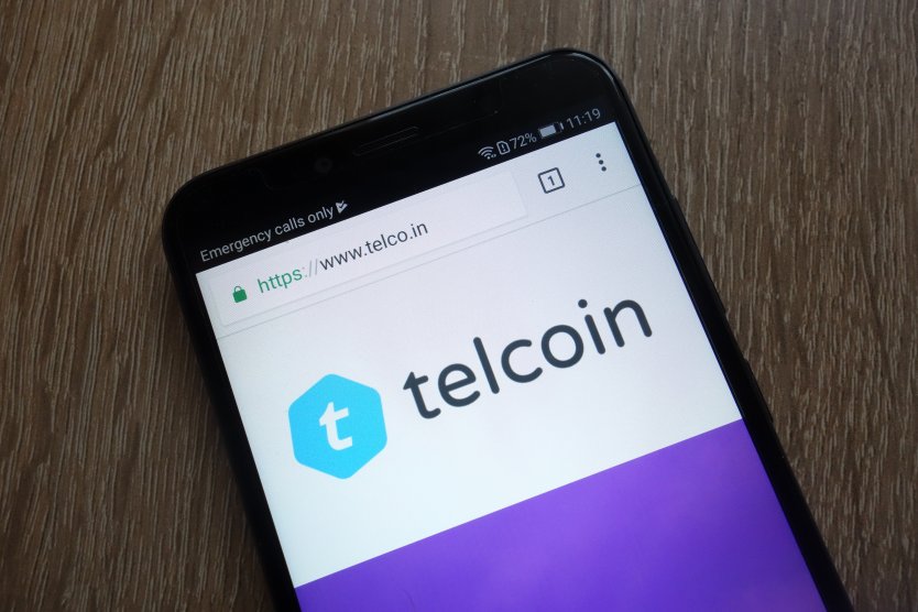 Telcoin logo on mobile phone