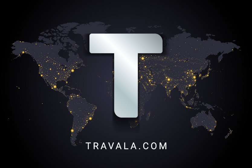 Image of a metallic T, the Travala logo, overlaid on a world map with the words Travala.com