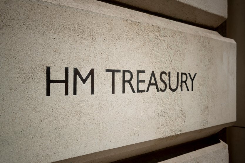 Sign for HM Treasury on the exterior of a building