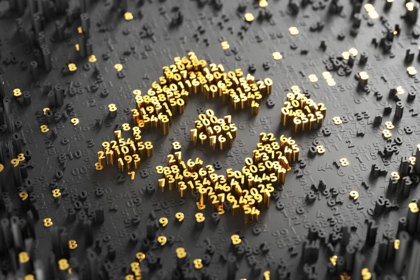 Binance logo made of gold numbers, against black and gold background