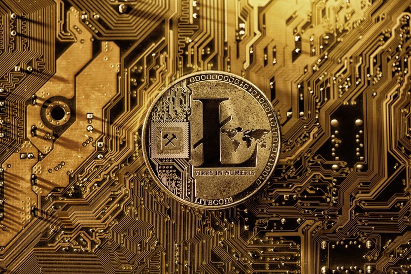 Litecoin token on a gold background