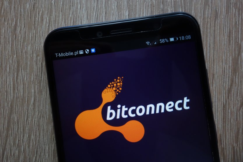 Smartphone displays company name and logo of BitConnect