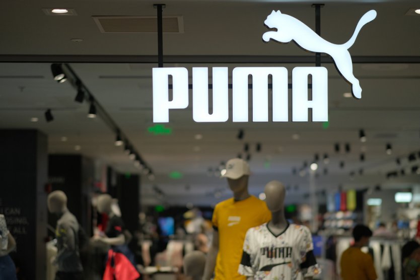 PUMA's shop sign hanging in store
