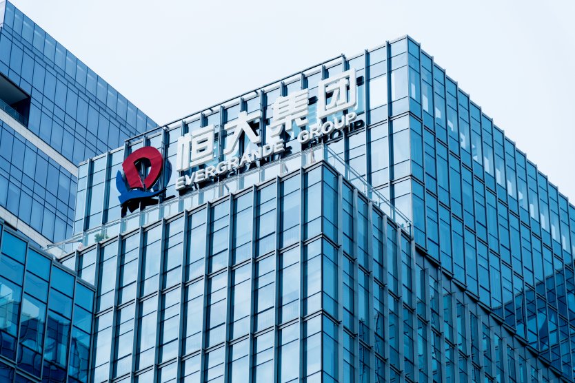 China Evergrande Group icon on office building wall in Shenzen, China