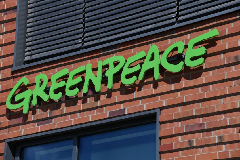 Exterior of a building displaying the logo of Greenpeace