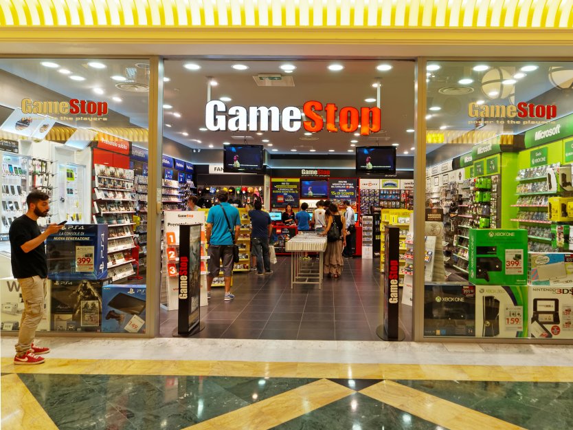GameStop shop with customers visible through large windows
