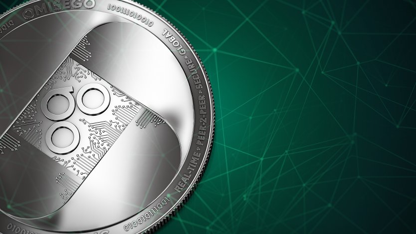 Representation of an OMG coin in silver on a green digital background