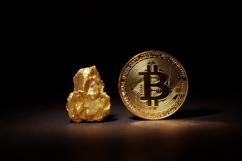 Bitcoin coin and a gold nugget