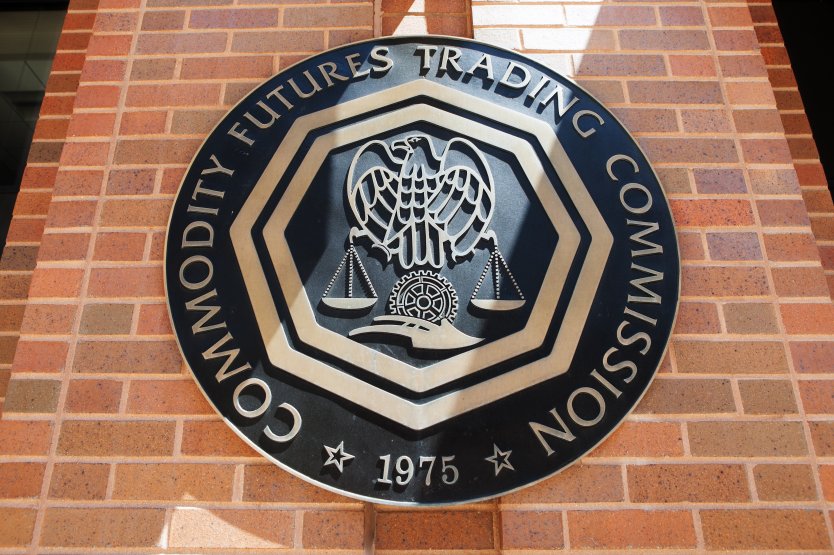 Logo of Commodity Futures Trading Commission on a wall